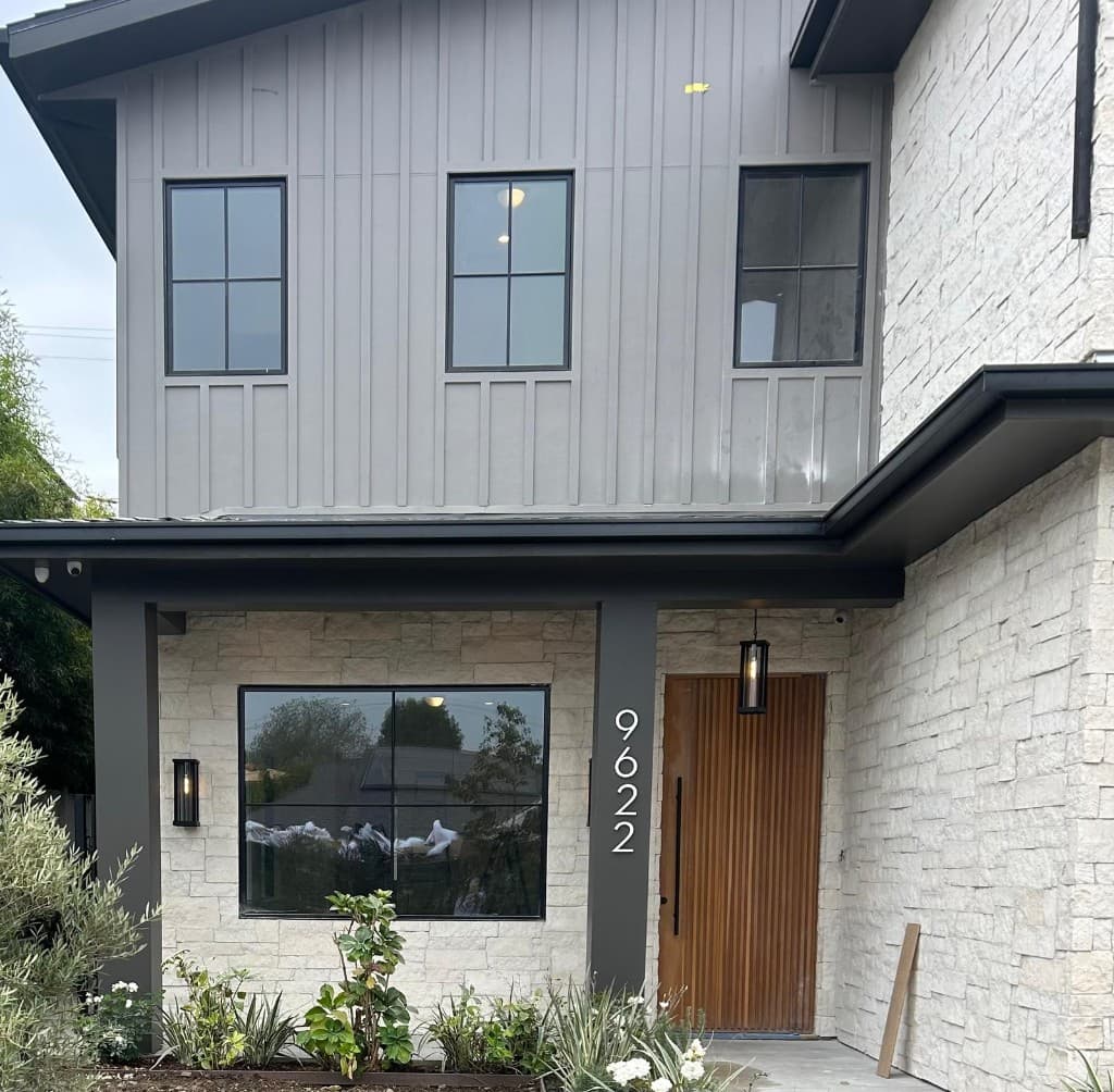 Contemporary Los Angeles home with stone facade and modern entry
