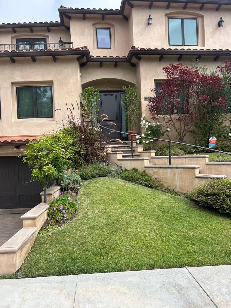Mediterranean-style Los Angeles residence with terraced front entry
